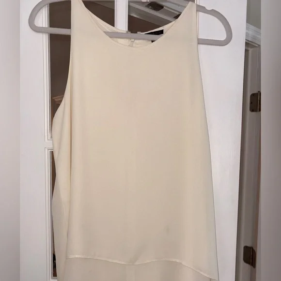 Sleeveless white blouse.  Chiffon Layered bottom and longer back. Large - Picture 8 of 13